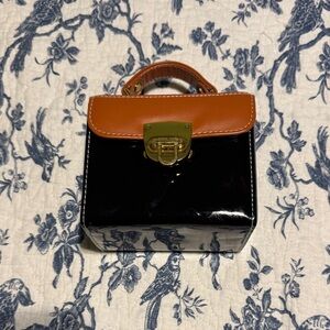 Elegant Black and Tan Women's Handbag